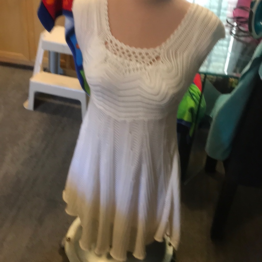 A beautiful white dress summer perfect dress it up or just as it is